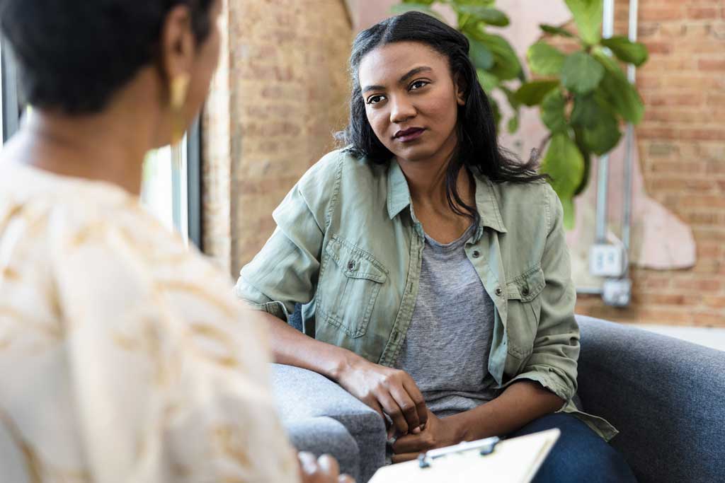Young woman at counselling session for mental health support