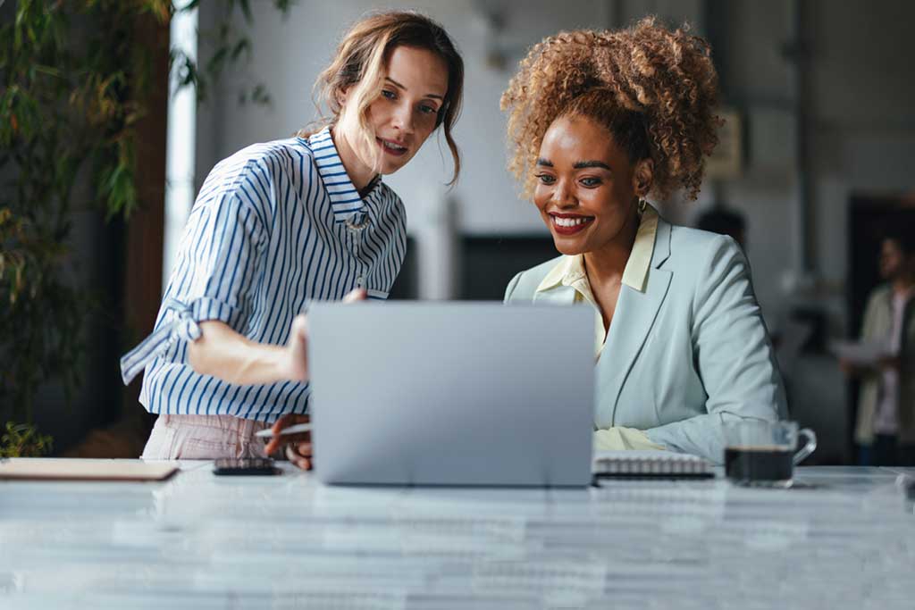 Entrepreneurial women working in office and collaborating
